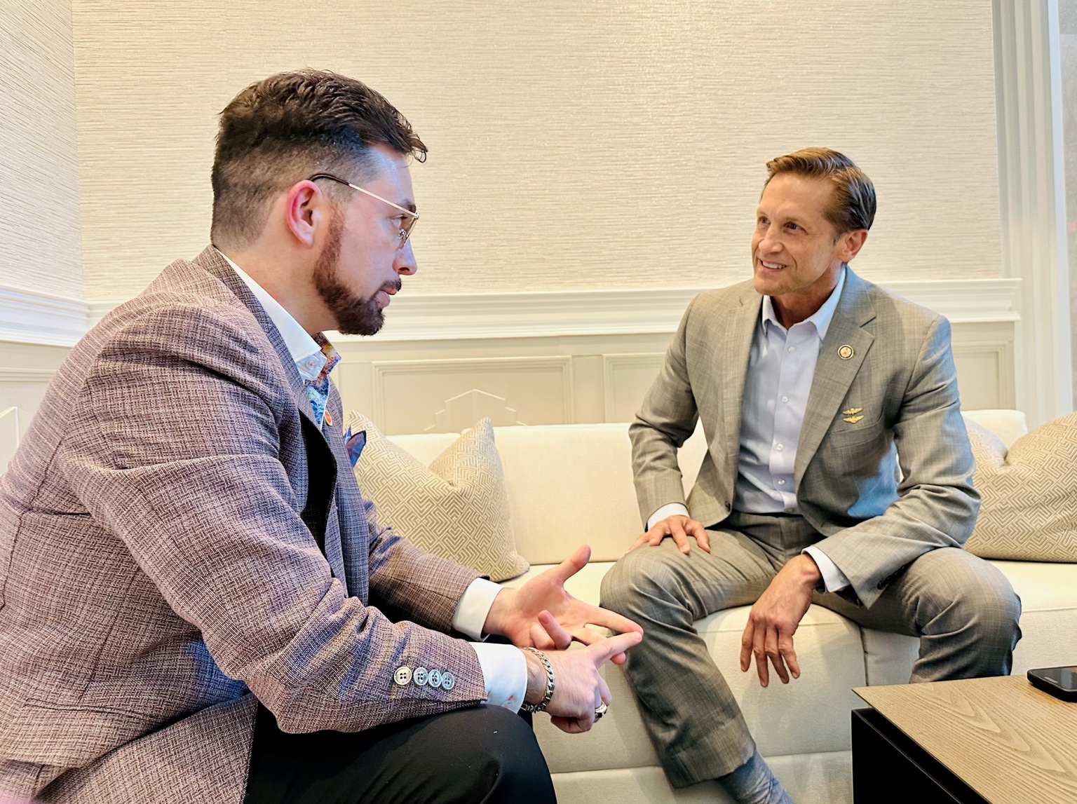 Two franchise industry professionals in conversation